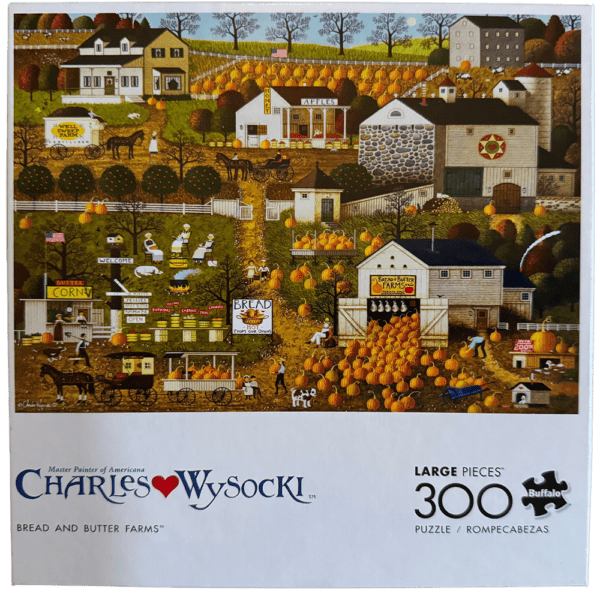 A puzzle of an old farm scene with many people.