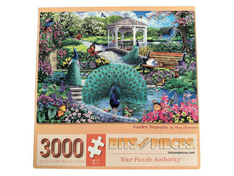 A large puzzle of a garden with peacocks and butterflies.