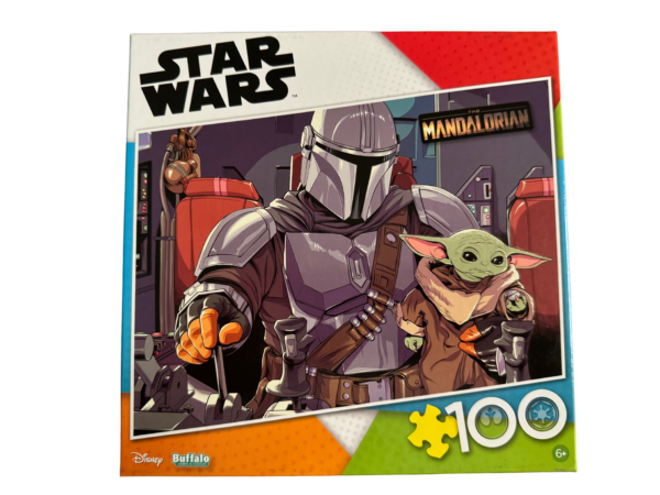 A star wars puzzle with the mandalorian and baby yoda.