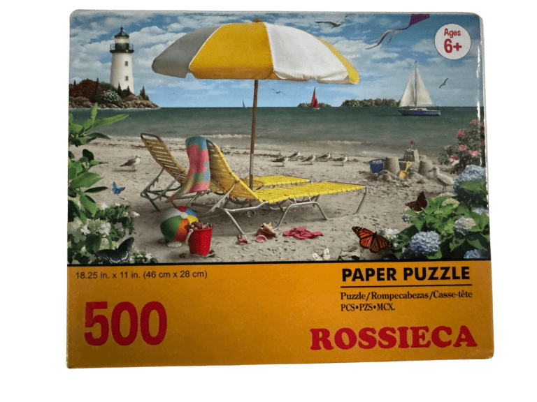 A beach scene with two chairs and an umbrella.