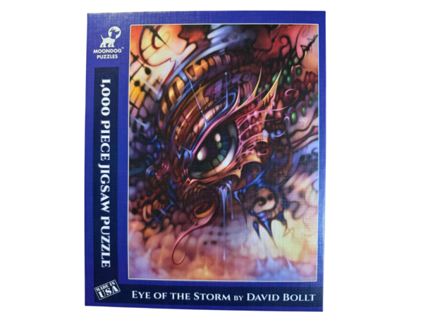 A blue and purple puzzle box with an eye of the storm on it.